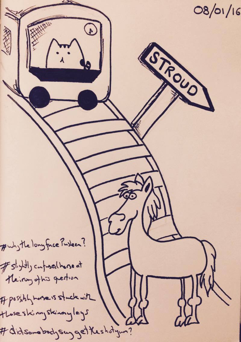 A photo of Pusheen drawing